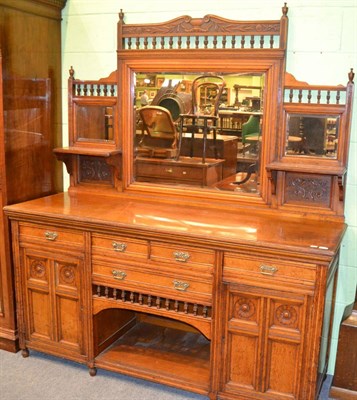 Lot 1271 - A large Victorian oak sideboard with mirror back