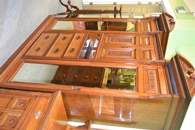 Lot 1272 - A Victorian mahogany combination wardrobe with two mirrored doors, three drawers and a cupboard