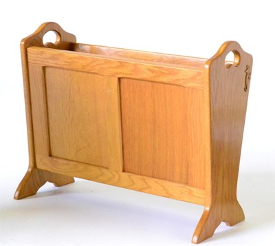 Lot 698 - A Michael  "Seahorse " Riley Panelled Oak Magazine Rack, with carrying handles and carved...