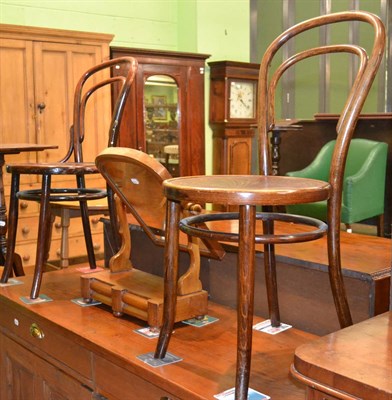 Lot 1278 - A toilet mirror, two bentwood chairs and a mahogany tripod table