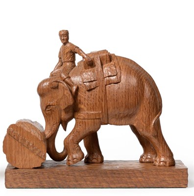 Lot 699 - Stan Dodds (1928-2012): A Carved Oak Group, of a Mahout riding an Indian elephant, the elephant...