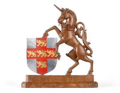 Lot 701 - Stan  "Woodpecker " Dodds (1928-2012): A Carved Oak Unicorn,(unchained) with crown around neck,...