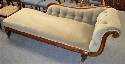 Lot 1319 - Victorian mahogany framed chaise longue on fluted supports with brass castors