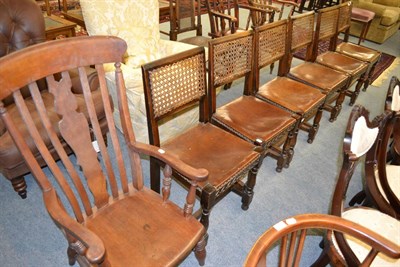 Lot 1323 - Set of six oak framed dining chairs with split cane backs and leather seats, together with a...