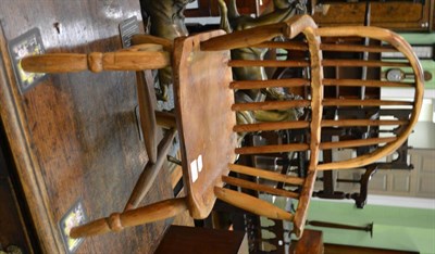 Lot 1334 - A child's yew wood Windsor chair