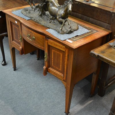 Lot 1337 - An Edwardian inlaid writing table