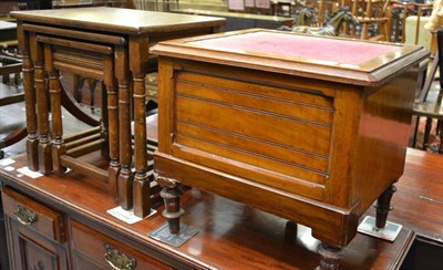 Lot 1348 - A nest of three oak tables and a commode