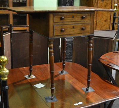 Lot 1356 - A 19th century work table with cross-banded top