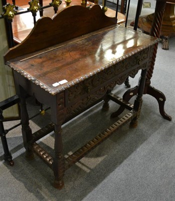 Lot 1358 - An 18th century oak side table fitted with one drawer