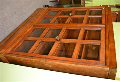 Lot 1367 - A glazed mahogany bookcase in the Empire style