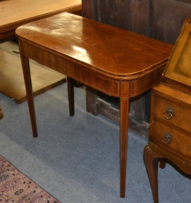 Lot 1380 - An early 19th century satin walnut fold-over tea table