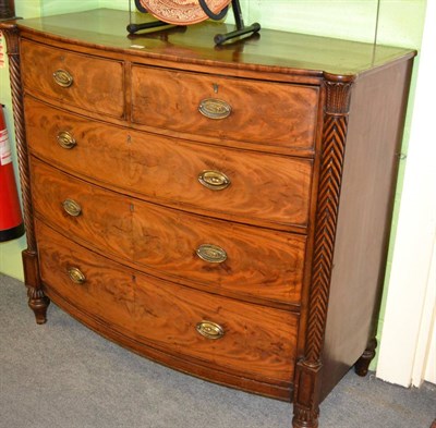 Lot 1381 - A George IV mahogany, tulipwood crossbanded and boxwood and ebony strung bowfront chest of drawers