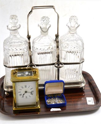 Lot 6 - Silver plate three bottle decanter stand, a brass cased carriage clock and small collection of...