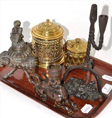 Lot 7 - Two brass string holders, rush light holder, figural candlestick, rams head jar with cover etc