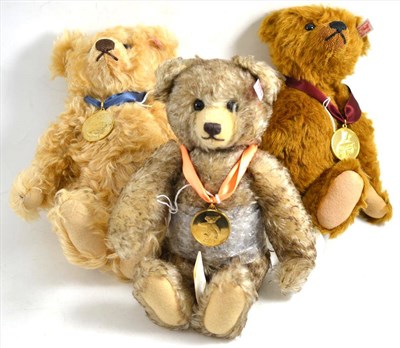 Lot 8 - Modern Steiff cinnamon mohair teddy bear; another with curly apricot mohair; and a taupe...