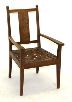 Lot 716 - An Arts & Crafts Arthur Simpson of Kendal Oak Armchair, shape no.9141, with carved splat,...