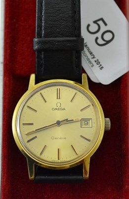 Lot 59 - A gold plated and steel centre seconds calendar wristwatch, signed Omega Geneve, with Omega box