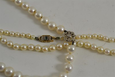 Lot 70 - Two cultured pearl necklaces with gem set clasps