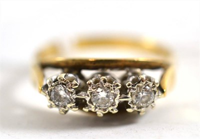 Lot 80 - A 9ct gold diamond three stone ring