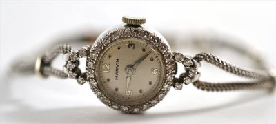 Lot 82 - A lady's diamond set wristwatch signed Marvin, case stamped 'Platinum' and a 9ct white gold...