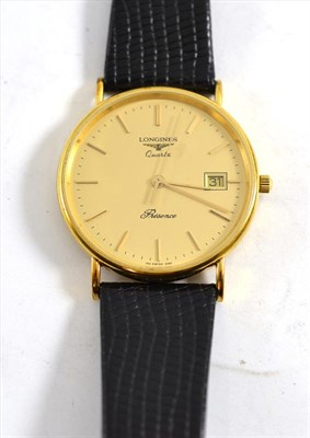 Lot 85 - A 9ct gold centre seconds calendar wristwatch, signed Longines, Resence, case stamped 9k375,...