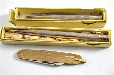Lot 89 - A 9ct gold penknife and two silver pencils