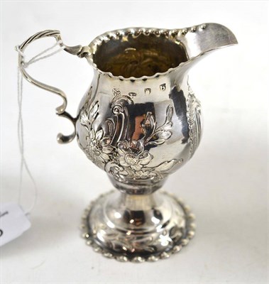 Lot 99 - A George III silver cream jug, London 1777