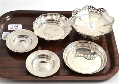 Lot 144 - Five silver pin trays and pierced silver tazza