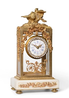 Lot 729 - A Gilt Metal and Paste Set Boudoir Timepiece, circa 1900, surmounted by two birds and decorated...