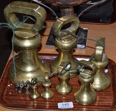 Lot 145 - Ten Victorian brass graduated weights