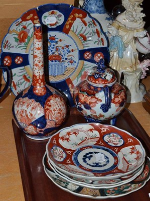 Lot 151 - Early 20th century Japanese Imari censer, an Imari vase, four plates and a charger