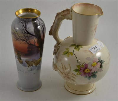 Lot 164 - Royal Doulton vase decorated with a shepherd and sheep in the snow and a Doulton pottery jug...