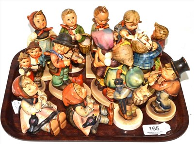 Lot 165 - A collection of Hummel figures