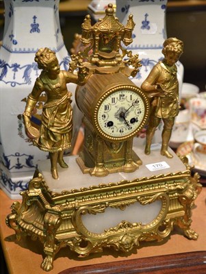 Lot 170 - A gilt metal striking mantel clock