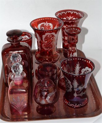 Lot 179 - Assorted red bohemian glass including three flared vases, decanter and stopper, drinking glass...