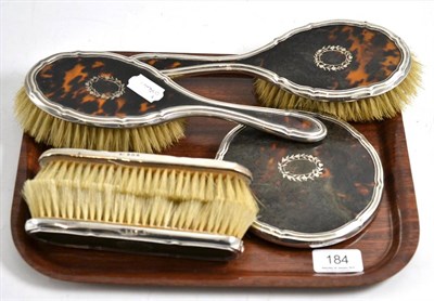 Lot 184 - Five piece silver and tortoiseshell dressing table set