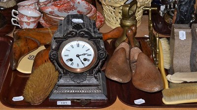 Lot 191 - Two trays of assorted collectable items including figural lamp, wooden shoes and boot trees,...