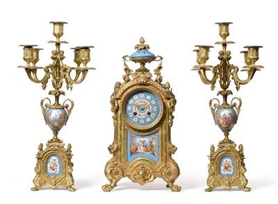 Lot 735 - An Ormolu and Porcelain Mounted Striking Mantel Clock with Garniture, circa 1880, urn finial...