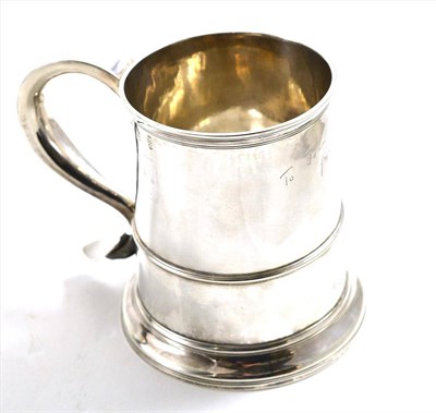 Lot 205 - A George II silver mug, Isaac Cookson, Newcastle 1749, of typical tapering form with a raised foot