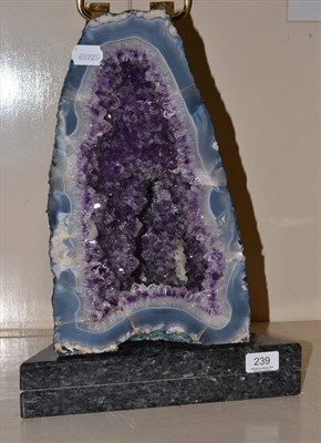 Lot 239 - An amethyst ";Cathedral"; rock sample and marble stand