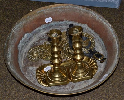 Lot 248 - Brassware comprising candlestick, shallow circular dish, horse brasses etc