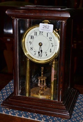 Lot 262 - A Wenge cased four glass clock