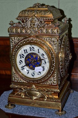 Lot 267 - Brass cased mantel clock with enamel dial