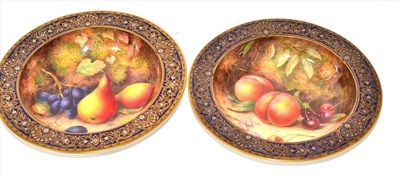 Lot 281 - A pair of Royal Worcester porcelain circular dishes, 1919 and 1926, painted by Richard...