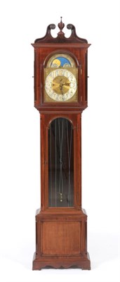 Lot 750 - An Edwardian Mahogany Chiming Longcase Clock, flat top pediment, side fret doors, glazed trunk door