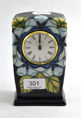 Lot 301 - Moorcroft mantel clock, tube lined and painted with stylised flowers, original box