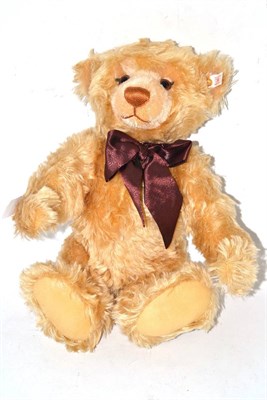 Lot 309 - A Steiff blond mohair Millenium' teddy bear, in original box with certificate, 40cm