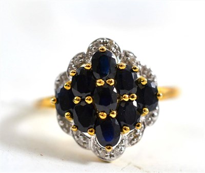 Lot 319 - A 9ct gold sapphire and diamond cluster ring