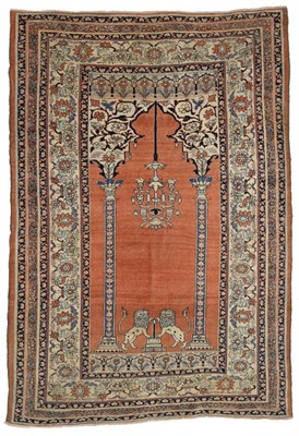 Lot 755 - Haji Jalili Prayer Rug Iranian Azerbaijan, late 19th century The madder field with two lions...