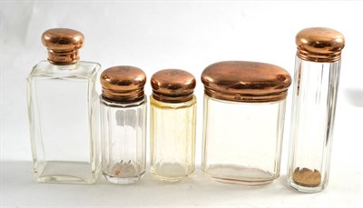 Lot 327 - Five glass bottles with 9ct gold lids